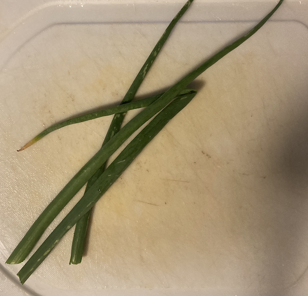 Onion Greens on Cutting Board